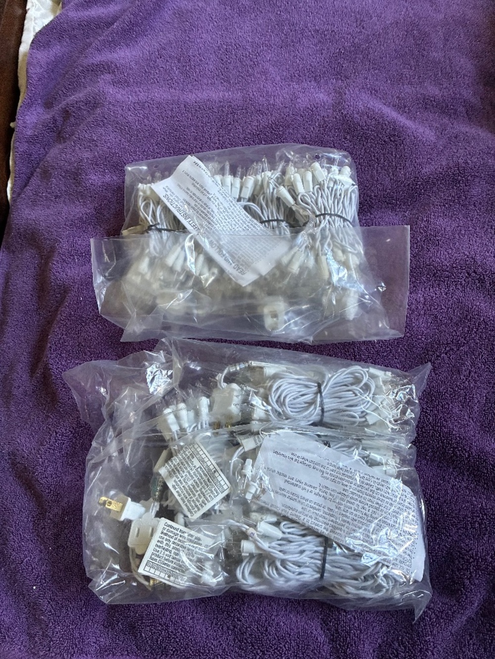 New in Bag 8 sets of 25 count White Indoor Holiday Lights